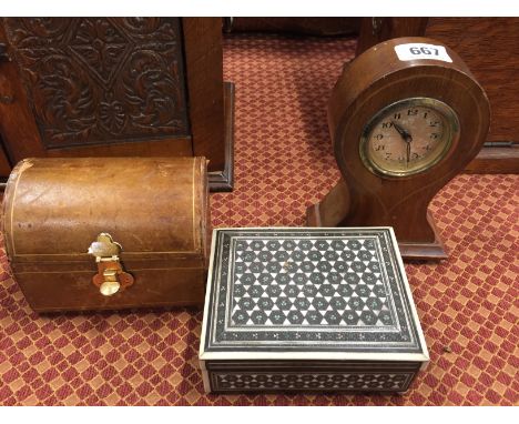 A miniature inlaid mahogany mantle clock together with a small leather dome topped jewellery box and a bone inlaid jewellery 