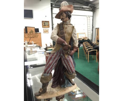 A large Lladro Gres china figure modelled as a Cavalier (28 inches approx.).