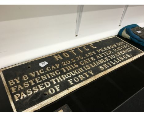 An original Railway cast Iron Notice 30 1/2" W by 9 1/2" H bearing the inscription BY 8 VIC.CAP.20.S.75 ANY PERSON NOT FASTEN