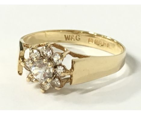 A 9 carat gold white stone set ring (size L 1/2).
(R11)