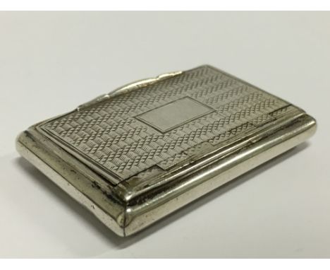 A Georgian rectangular engraved silver snuff box with gilt interior.