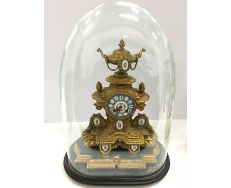 A large 19th century Japy Freres Ormolu cased mantle clock with inset Sevres style panels, decorated with garlands and bouque