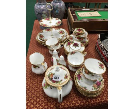 The residue of a Royal Albert bone china tea service decorated in the Old Country Roses pattern.