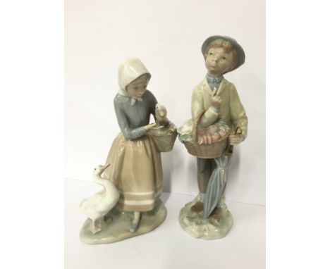 A Lladro china figure modelled as a Young Girl holding a gosling with another in a basket, a goose at her side together with 