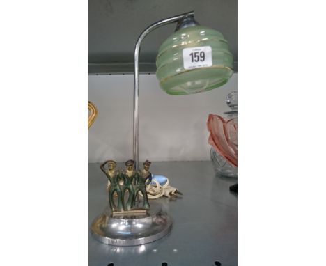 A small Art Deco table lamp base with original green glass shade and three drunken sailor cold painted brass mount.