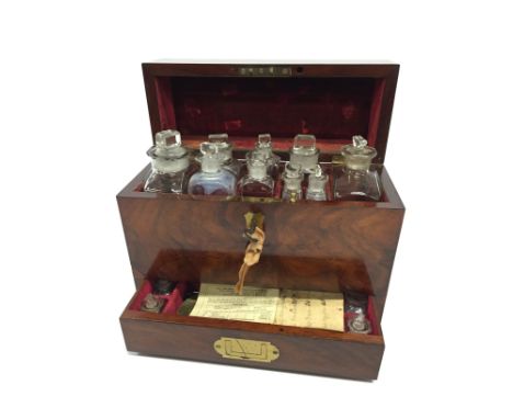 A 19th century flame mahogany apothecary's travelling chest with inset brass handles, the base with integral drawer fitted wi