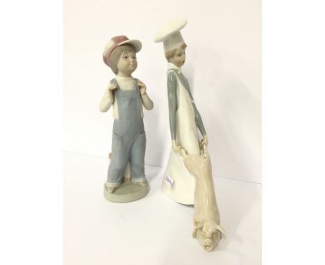 A Lladro china figure modelled as a Young Chef holding a pig by its hind legs together with a Bisque Lladro china figure mode