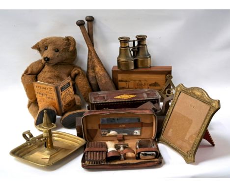 INTERESTING SELECTION OF COLLECTABLE ITEMSincluding a pair of brass bound binoculars, a brass chamber stick, a leather cased 