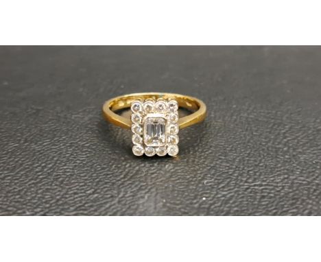 DIAMOND CLUSTER RINGthe central emerald cut diamond approximately 0.3cts in fourteen diamond surround totalling approximately