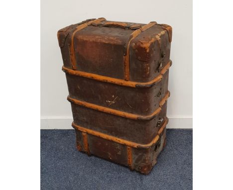 VINTAGE TRAVEL TRUNKwith wood banding and leather side carry handles, 33cm x 79cm 53cm 