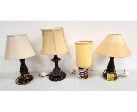 FOUR VARIOUS WOODEN TABLE LAMP BASES, including a mid century teak example, the tallest 28cm high (including fitting) (4) 
