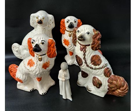 PAIR OF POTTERY WALLY DOGSwith terracotta and gilt decoration, 30cm high, together with two other Wally dogs, 34cm high and 3