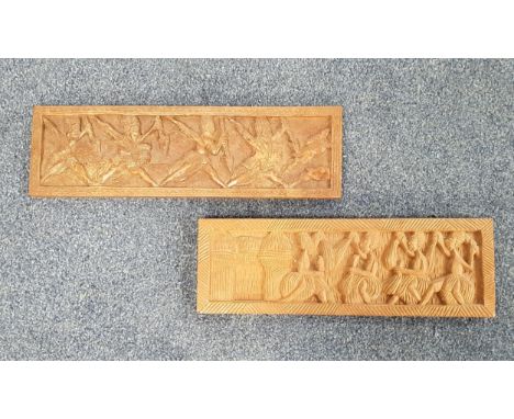 TWO VINTAGE WEST AFRICAN CARVED WOOD PICTURESboth with figure scenes, 14.5cm x 49cm and 14.5cm x 45cm (2) 