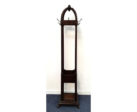 VINTAGE STAINED WOOD TAPERING COAT STANDof square design with crossed arch top detail, with a selection of hooks and drip tra