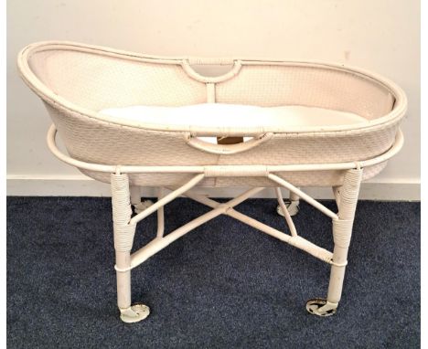 VINTAGE LLOYD LOOM STYLE WICKER CRIBwith a removable shaped body, on a wheeled base, 77cm x 79cm x 46.5cm 
