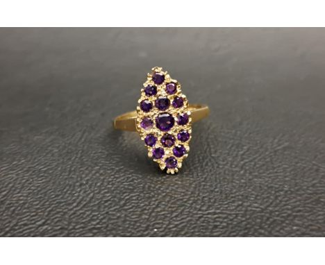 ATTRACTIVE AMETHYST CLUSTER RING the multi amethysts set in marquise shaped setting, in all approximately 0.68cts, on a nine 