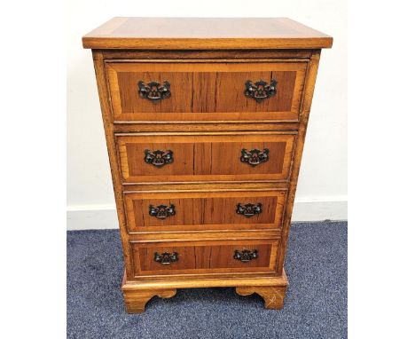 YEW AND CROSSBANDED CHEST OF DRAWERSwith four cockbeaded drawers, standing on bracket feet, 73.5cm x 44cm x 33cm 