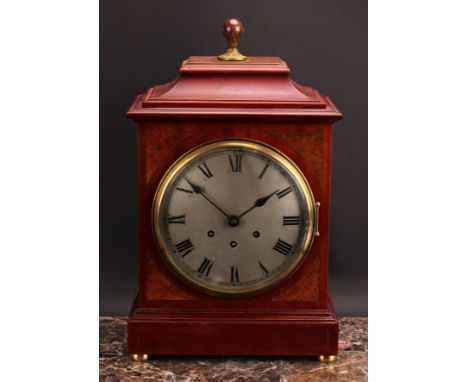 An early 20th century mahogany bracket-form mantel clock, 20cm circular silvered dial inscribed with Roman numerals, three wi