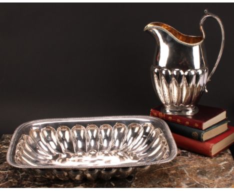 A 19th century Russian silver half-fluted rectangular ewer and basin, gadrooned borders, gilt interior, the basin 36.5cm wide