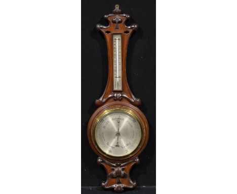 An Art Nouveau oak wheel barometer, 19.5cm circular silvered register inscribed ROSS, the shaped case of stylised organic for