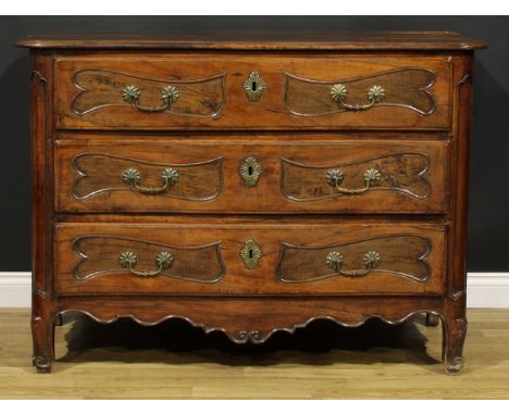 An 18th century French Provincial chestnut serpentine commode, slightly oversailing top with moulded edge above three long dr