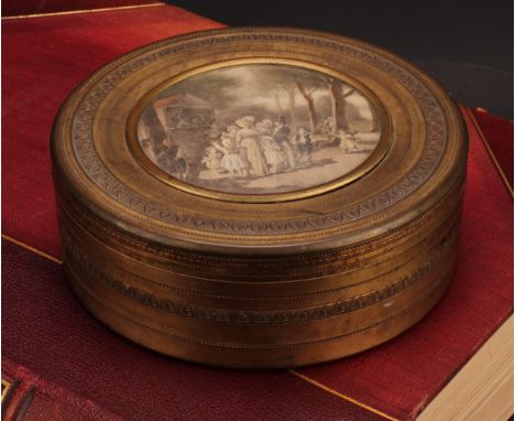A 19th century gilt metal circular box, the push-fitting cover set with a polychrome print depicting a Punch and Judy show, w