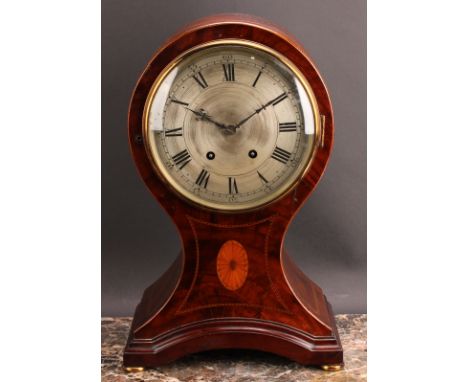 A large Edwardian mahogany balloon shaped mantel clock, 19cm silvered dial inscribed with Roman numerals, twin winding holes,
