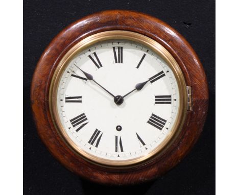 An early 20th century oak school or railway type timepiece, of small proportions, 18cm clock dial inscribed with Roman numera