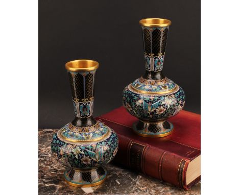 A pair of Chinese cloisonne enamel ovoid pedestal vases, brightly decorated in polychrome with butterflies, flowers, lotus an