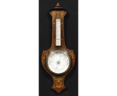 An Edwardian rosewood and marquetry shield-form wheel barometer, 18.5cm circular register, the case inlaid with bell husks an