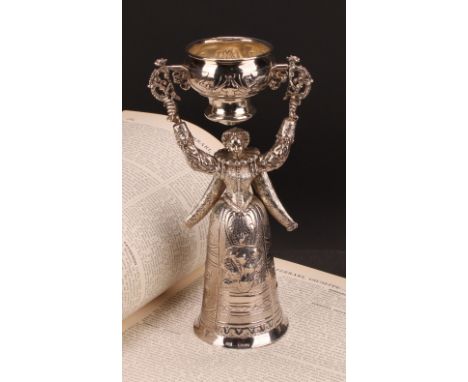 A Continental silver figural wager cup, of typical Renaissance figural form, 21cm high, import marks for Berthold Muller, Lon