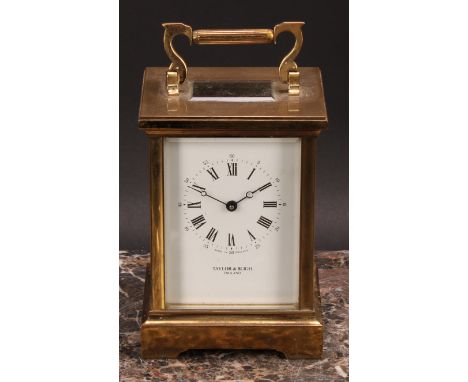 A lacquered brass carriage timepiece, 7cm enamel clock dial inscribed Taylor &amp; Bligh, England, Roman and subsidiary Arabi