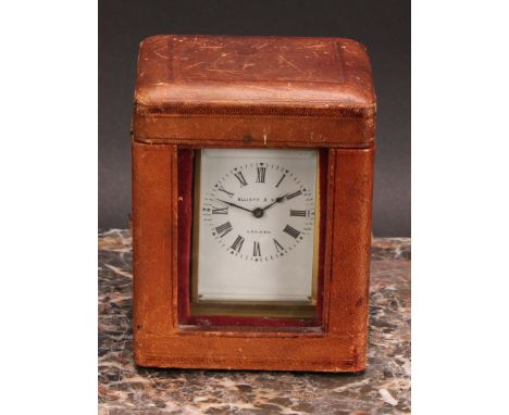 An early 20th century brass carriage timepiece, of small proportions, 4cm rectangular enamel clock dial inscribed Elliott &am