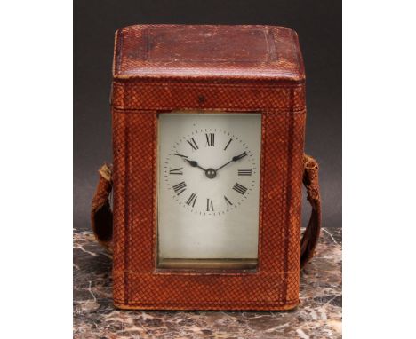 An early 20th century brass carriage clock, 5.5cm rectangular enamel dial inscribed with Roman numerals, key-wound movement w