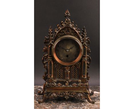 A Gothic Revival mantel timepiece, 7cm silvered clock dial inscribed with Arabic numerals, single winding hole, eight-day mov
