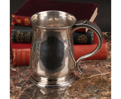 A George II West Country provincial silver bell shaped beer mug, scroll handle, skirted base, 12cm high, maker TB, Exeter 174