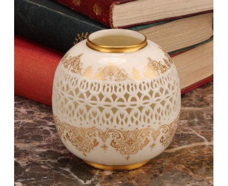 A Royal Worcester ovoid reticulated vase, by George Owen, outlined with gilt bands of scrolls and strapwork, 7.5cm high, inci
