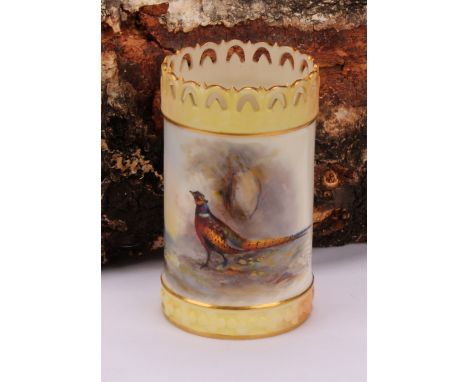 A Royal Worcester cylindrical vase, painted by Jas Stinton, signed, with pheasant in a landscape, the pierced rim and moulded