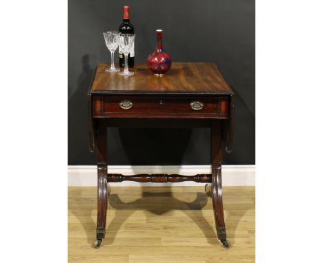 A 19th century mahogany sofa table, rounded rectangular top with fall leaves above a frieze drawer, blind to verso, turned st