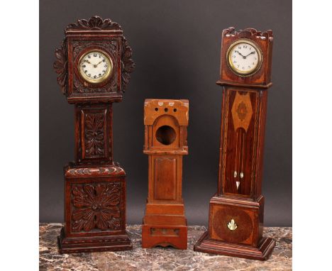 An early 20th century mahogany and marquetry miniature longcase clock, inlaid in the Secessionist taste with coloured woods a