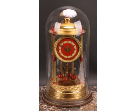 A mid-20th century brass perpetual mantel time piece, 12cm clock dial with silvered chapter ring inscribed with Arabic numera
