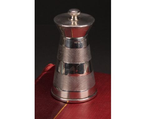 An Art Deco style silver spreading cylindrical pepper grinder, engine turned in three broad bands, 9.5cm high, J Gloster Ltd,