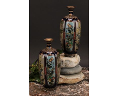 A pair of Japanese cloisonne enamel lobed ovoid vases, painted in polychrome with flowers within shaped panels, 15cm high, si