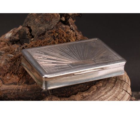 A 19th century Austrian silver waisted rectangular snuff box, hinged cover chased with radiating bands, gilt interior, 8cm wi