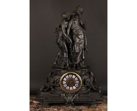 A late 19th century French spelter figural mantel clock, 9.5cm circular dial applied with Roman numerals, twin winding holes,