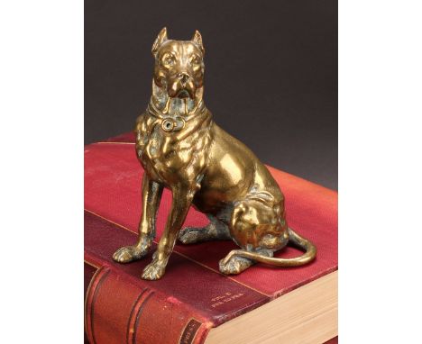 An early 20th century bronze novelty inkwell, as a dog, seated, his head hinged as the cover, painted eyes, 17cm high, c.1910