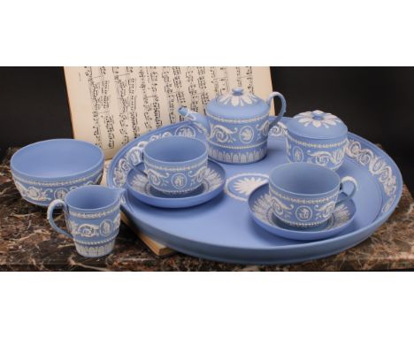 A Wedgwood jasperware cabaret set, comprising teapot, milk jug, sucrier and cover, two cups and saucers and a circular tray, 