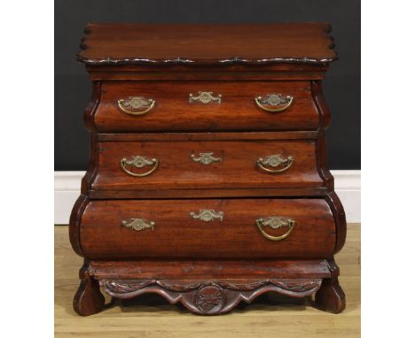 Miniature Furniture - a 19th century Dutch bombe commode or chest, of three long drawers, the shaped apron centred by a carve