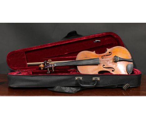 A German violin, the two-piece back 36cm long excluding button, paper label printed Manufactured in Berlin, Special Copy of A