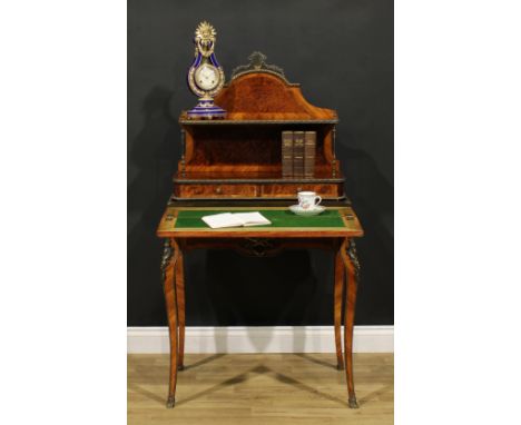 A Louis XV Revival amboyna and kingwood bonheur du jour, shaped superstructure with a shelf and two small drawers, above a fo